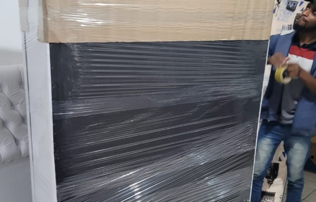 Profissionais MA Mudanças realizando transporte seguro de móveis